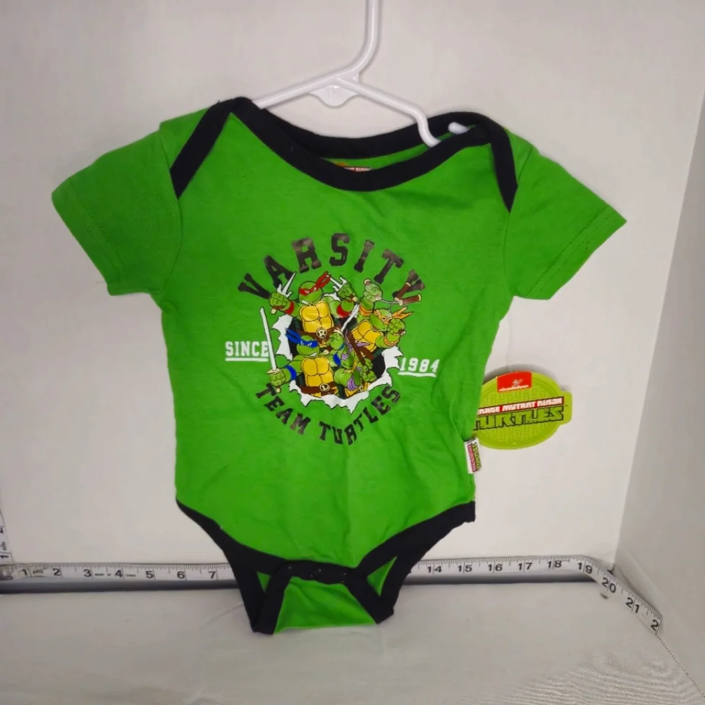 NICKELODEON TEENAGE‎ MUTANT NINJA TURTLE VARSITY TEAM TURTLES ONSIE 6-9 MONTHS